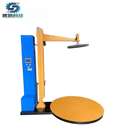 Pallet wrapping machine with top press plate