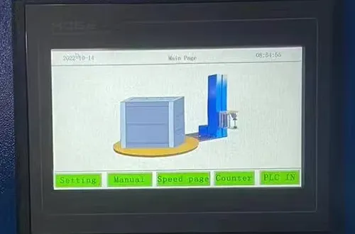 Pallet wrapping machine with top press plate